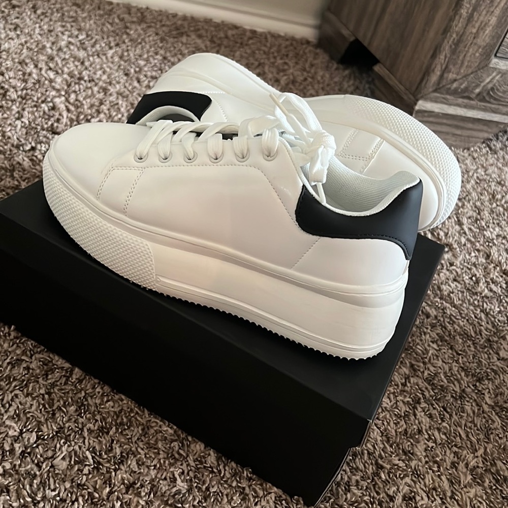 Size 8 1/2 black and white platform sneakers
